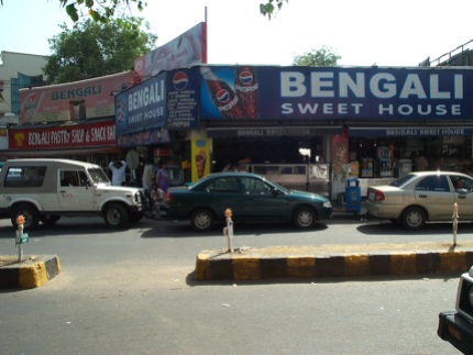 Bengali Sweets, exterior. We ate there on this trip, but from the lack of a dull haze in this photograph you may be able to tell that it was taken in the summer (of 2005, to be exact).