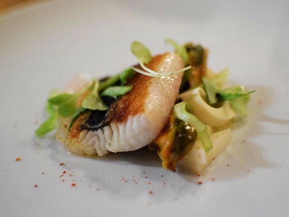 Spanish mackerel with pickled hearts of palm, guanciale, smoked mussels, and lovage