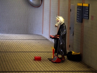 Hong Kong: Horse musician in pedestrian subway in Tsim Sha Tsui