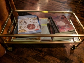 Does anyone ever read the books restaurants like to leave lying around their entrances?